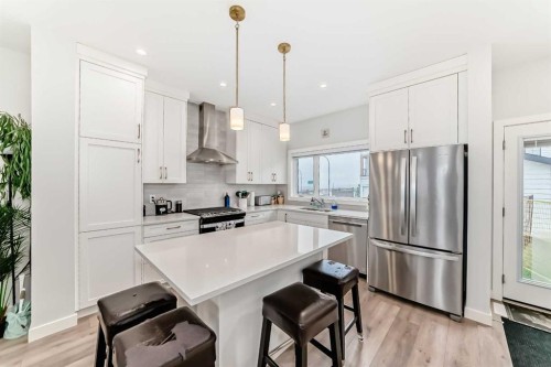 13 Treeline Avenue Sw, Calgary, AB - Indoor Photo Showing Kitchen With Stainless Steel Kitchen With Upgraded Kitchen