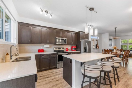 80 Legacy Glen Row Se, Calgary, AB - Indoor Photo Showing Kitchen With Double Sink