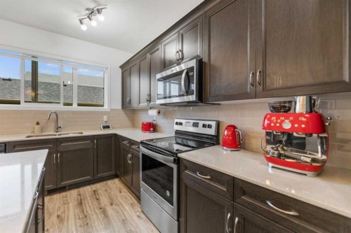 80 Legacy Glen Row Se, Calgary, AB - Indoor Photo Showing Kitchen With Upgraded Kitchen