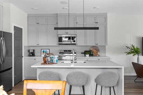 239 Lewiston Drive Ne, Calgary, AB - Indoor Photo Showing Kitchen With Upgraded Kitchen