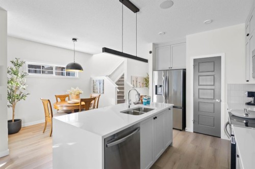 239 Lewiston Drive Ne, Calgary, AB - Indoor Photo Showing Kitchen With Double Sink With Upgraded Kitchen