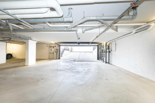 111-20 Sage Hill Terrace Nw, Calgary, AB - Indoor Photo Showing Garage