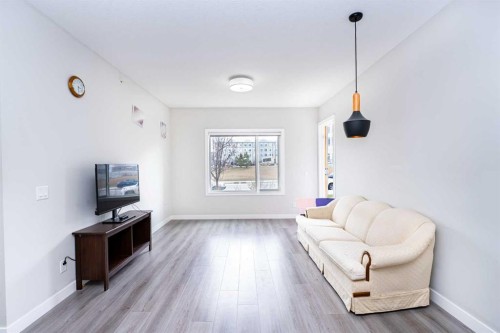 111-20 Sage Hill Terrace Nw, Calgary, AB - Indoor Photo Showing Living Room