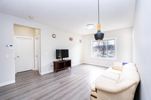 111-20 Sage Hill Terrace Nw, Calgary, AB - Indoor Photo Showing Living Room