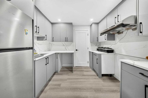 37 Rainbow Falls Boulevard, Chestermere, AB - Indoor Photo Showing Kitchen