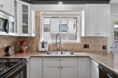 7539 Hunterview Drive Nw, Calgary, AB  - Indoor Photo Showing Kitchen With Double Sink 