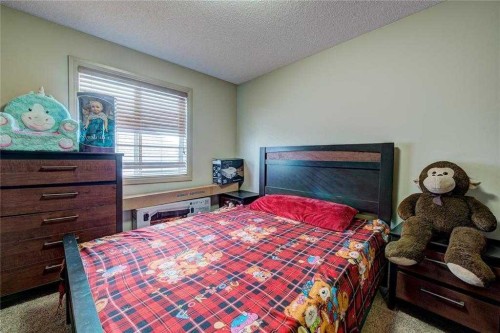 12 Skyview Springs Gardens Ne, Calgary, AB - Indoor Photo Showing Bedroom