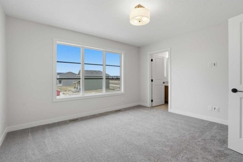 92 Buffaloberry Manor Se, Calgary, AB - Indoor Photo Showing Other Room