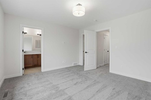 92 Buffaloberry Manor Se, Calgary, AB - Indoor Photo Showing Other Room