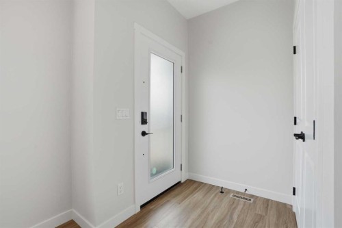 92 Buffaloberry Manor Se, Calgary, AB - Indoor Photo Showing Other Room