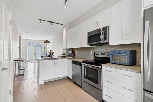 42 Sherwood Row Nw, Calgary, AB - Indoor Photo Showing Kitchen With Stainless Steel Kitchen With Upgraded Kitchen