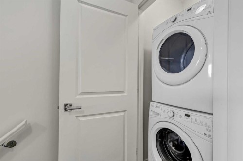 42 Sherwood Row Nw, Calgary, AB - Indoor Photo Showing Laundry Room