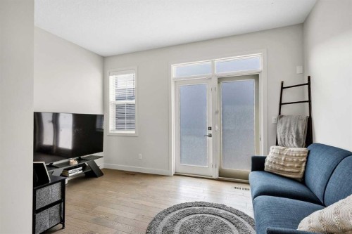 42 Sherwood Row Nw, Calgary, AB - Indoor Photo Showing Living Room