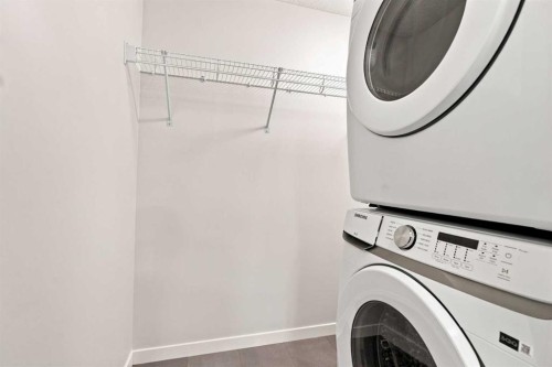 2306-33 Carringham Gate Nw, Calgary, AB - Indoor Photo Showing Laundry Room