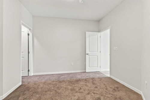 2306-33 Carringham Gate Nw, Calgary, AB - Indoor Photo Showing Other Room