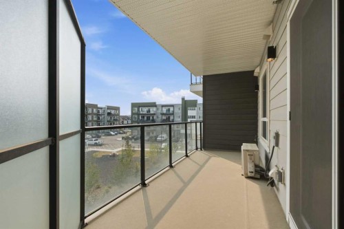 2306-33 Carringham Gate Nw, Calgary, AB - Outdoor With Balcony With Exterior