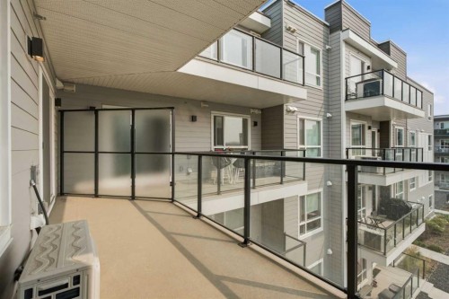 2306-33 Carringham Gate Nw, Calgary, AB - Outdoor With Balcony With Exterior