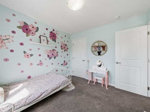414 Windrow Common Sw, Airdrie, AB - Indoor Photo Showing Bedroom