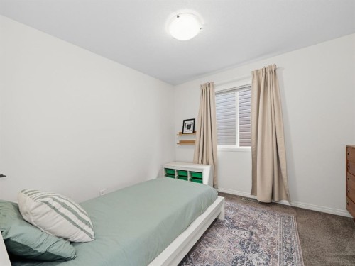 414 Windrow Common Sw, Airdrie, AB - Indoor Photo Showing Bedroom