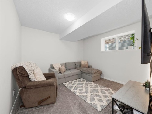 414 Windrow Common Sw, Airdrie, AB - Indoor Photo Showing Living Room