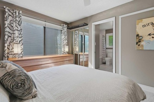 111 Coachwood Crescent Sw, Calgary, AB - Indoor Photo Showing Bedroom