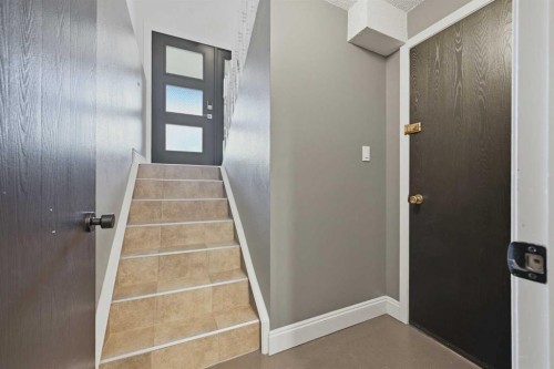 111 Coachwood Crescent Sw, Calgary, AB - Indoor Photo Showing Other Room
