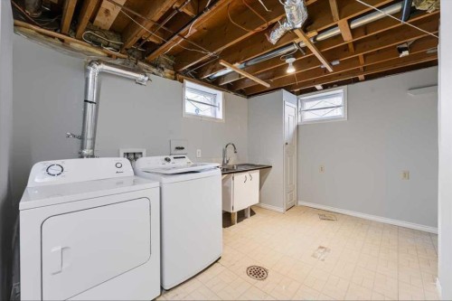 10827 Brae Road Sw, Calgary, AB - Indoor Photo Showing Laundry Room
