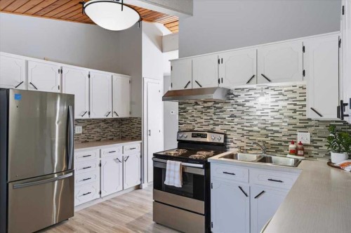 10827 Brae Road Sw, Calgary, AB - Indoor Photo Showing Kitchen With Double Sink