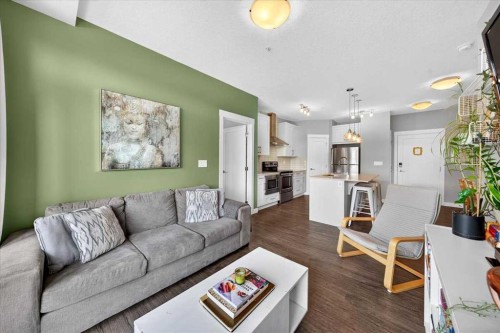310-10 Walgrove Se, Calgary, AB - Indoor Photo Showing Living Room