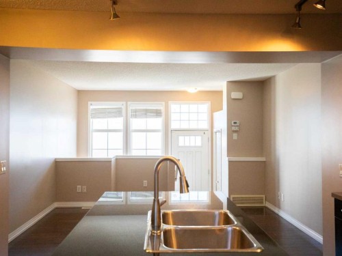 49 Auburn Bay Common Se, Calgary, AB - Indoor Photo Showing Kitchen With Double Sink