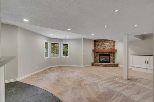 35 Strasbourg Bay Sw, Calgary, AB - Indoor With Fireplace