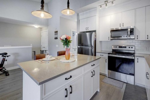 214 Livingston Common Ne, Calgary, AB - Indoor Photo Showing Kitchen