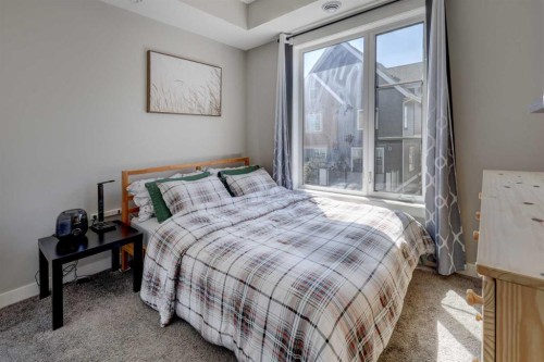 214 Livingston Common Ne, Calgary, AB - Indoor Photo Showing Bedroom