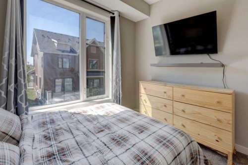 214 Livingston Common Ne, Calgary, AB - Indoor Photo Showing Bedroom
