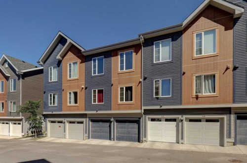 214 Livingston Common Ne, Calgary, AB - Outdoor With Facade