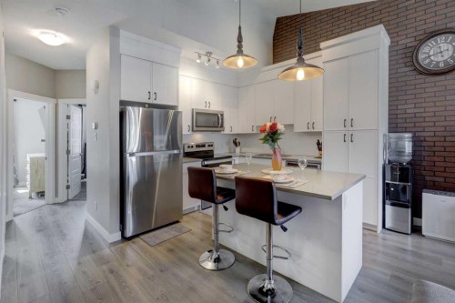 214 Livingston Common Ne, Calgary, AB - Indoor Photo Showing Kitchen With Stainless Steel Kitchen
