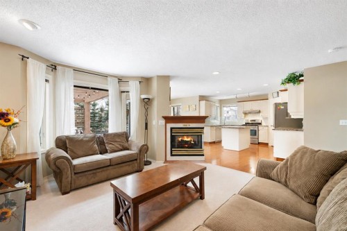 69 Hampstead Gardens Nw, Calgary, AB - Indoor Photo Showing Living Room With Fireplace