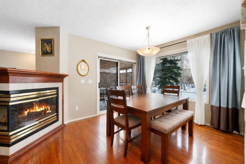 69 Hampstead Gardens Nw, Calgary, AB - Indoor Photo Showing Other Room With Fireplace