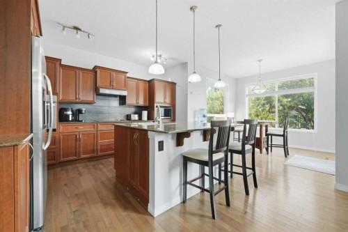 38 Silverado Skies Crescent Sw, Calgary, AB - Indoor Photo Showing Kitchen With Upgraded Kitchen