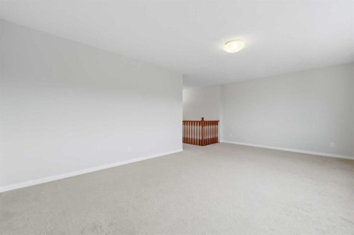 38 Silverado Skies Crescent Sw, Calgary, AB - Indoor Photo Showing Other Room