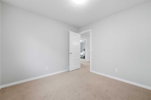 38 Silverado Skies Crescent Sw, Calgary, AB - Indoor Photo Showing Other Room