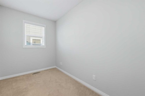 38 Silverado Skies Crescent Sw, Calgary, AB - Indoor Photo Showing Other Room