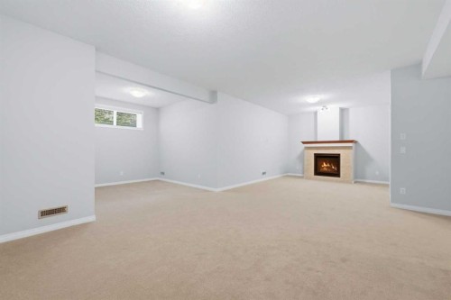 38 Silverado Skies Crescent Sw, Calgary, AB - Indoor With Fireplace