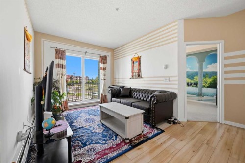 2206-1140 Taradale Drive Ne, Calgary, AB - Indoor Photo Showing Living Room