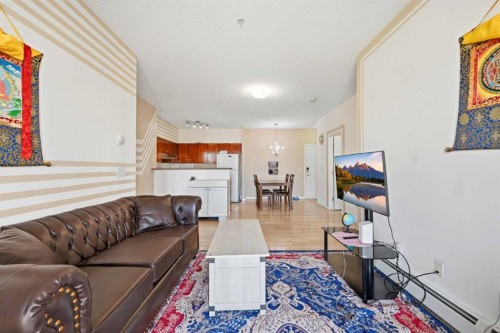 2206-1140 Taradale Drive Ne, Calgary, AB - Indoor Photo Showing Living Room