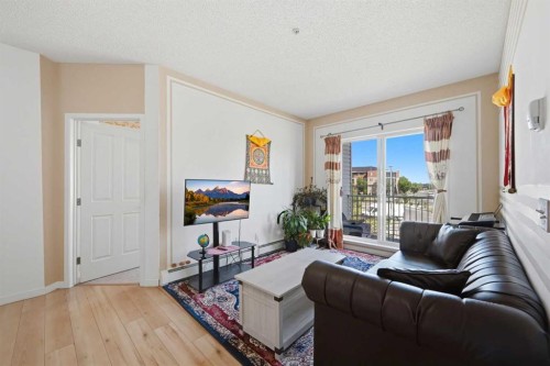 2206-1140 Taradale Drive Ne, Calgary, AB - Indoor Photo Showing Living Room