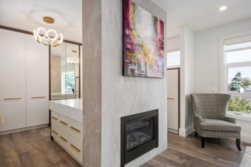 1414 Scotland Street Sw, Calgary, AB - Indoor Photo Showing Living Room With Fireplace