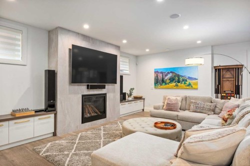 1414 Scotland Street Sw, Calgary, AB - Indoor Photo Showing Living Room With Fireplace
