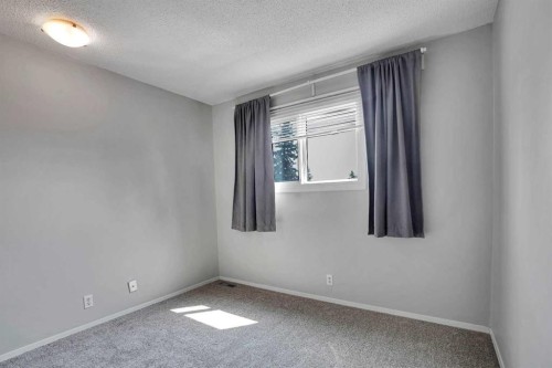 6-6404 4A Street Ne, Calgary, AB - Indoor Photo Showing Other Room