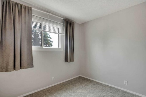 6-6404 4A Street Ne, Calgary, AB - Indoor Photo Showing Other Room